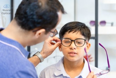 A Kid Enjoying the Lens at Nusrat Opticals Anna Nagar Madurai